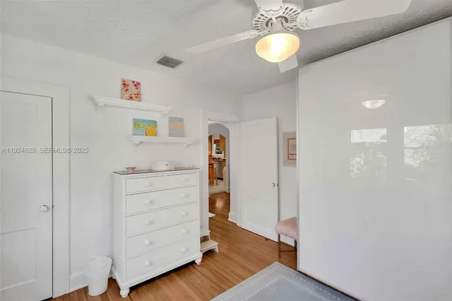 a view of a hallway with closet