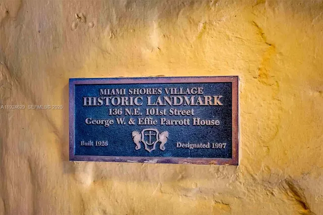 a wall with a sign on it