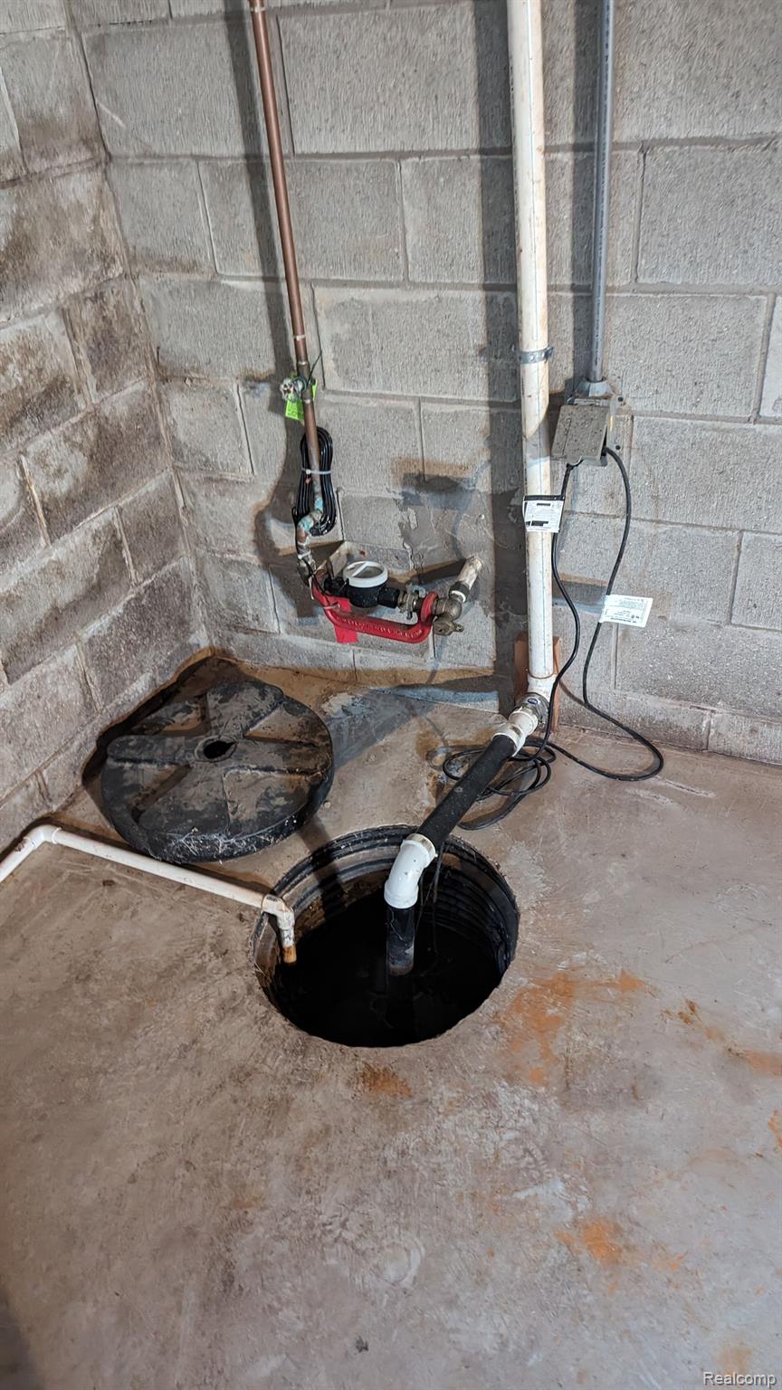 6227 Kenbrook Road Lansing, MI 48911 - Photo 23 of 24 SUMP PUMP