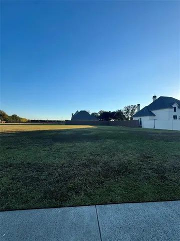a view of outdoor space and yard