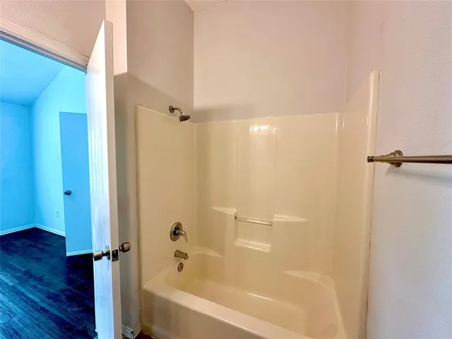 a bathroom with a bathtub