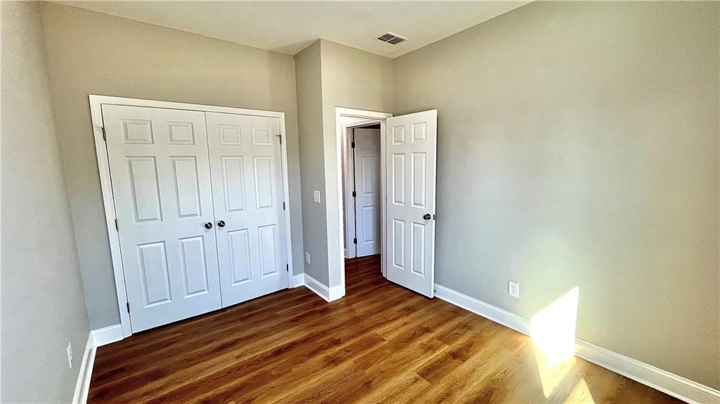 23 S Road Griffin, GA 30224 - Photo 21 of 32 a view of a room with wooden floor