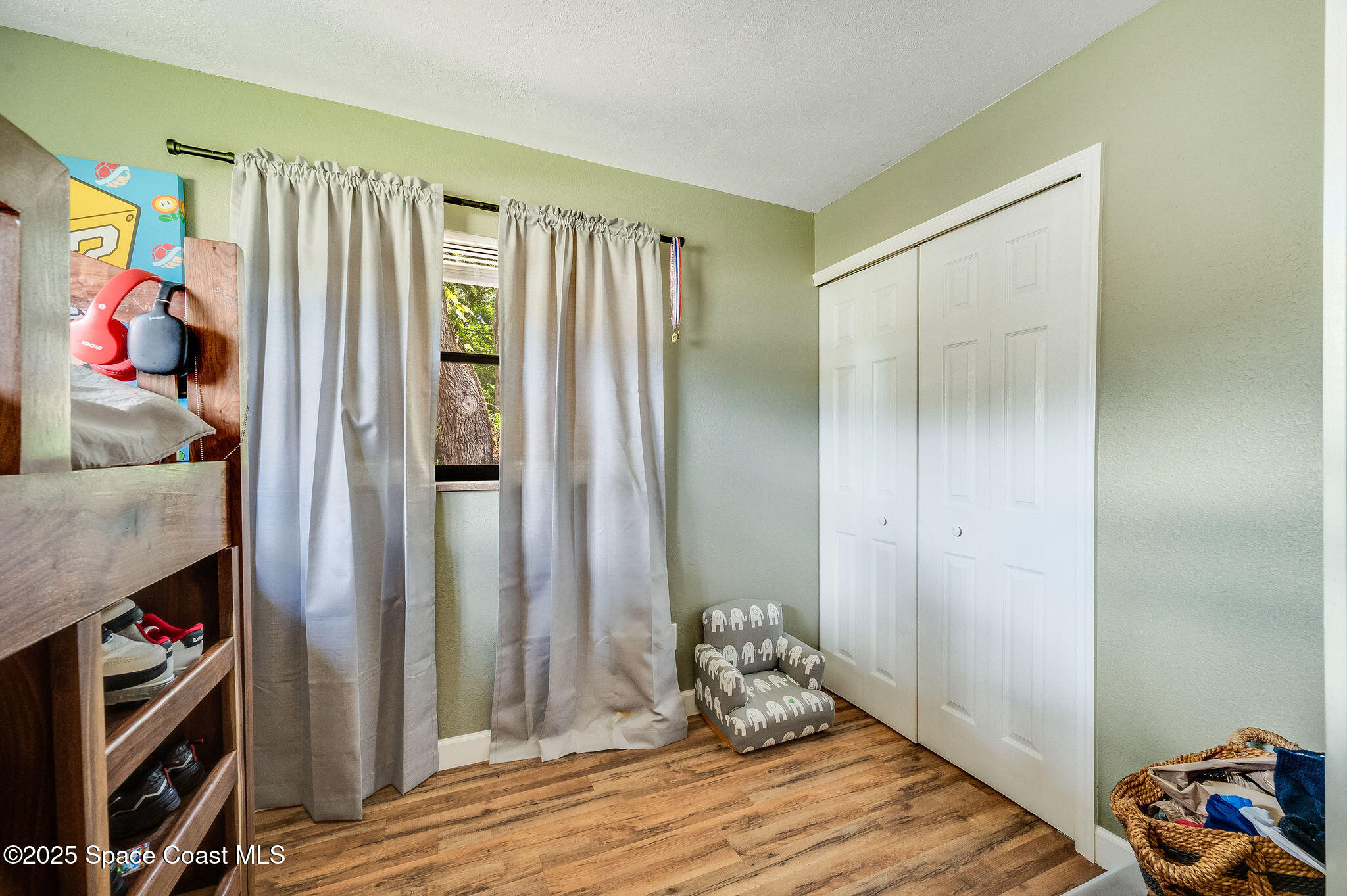 369 Western Avenue Cocoa, FL 32926 - Photo 19 of 38 a room with a bed and a window