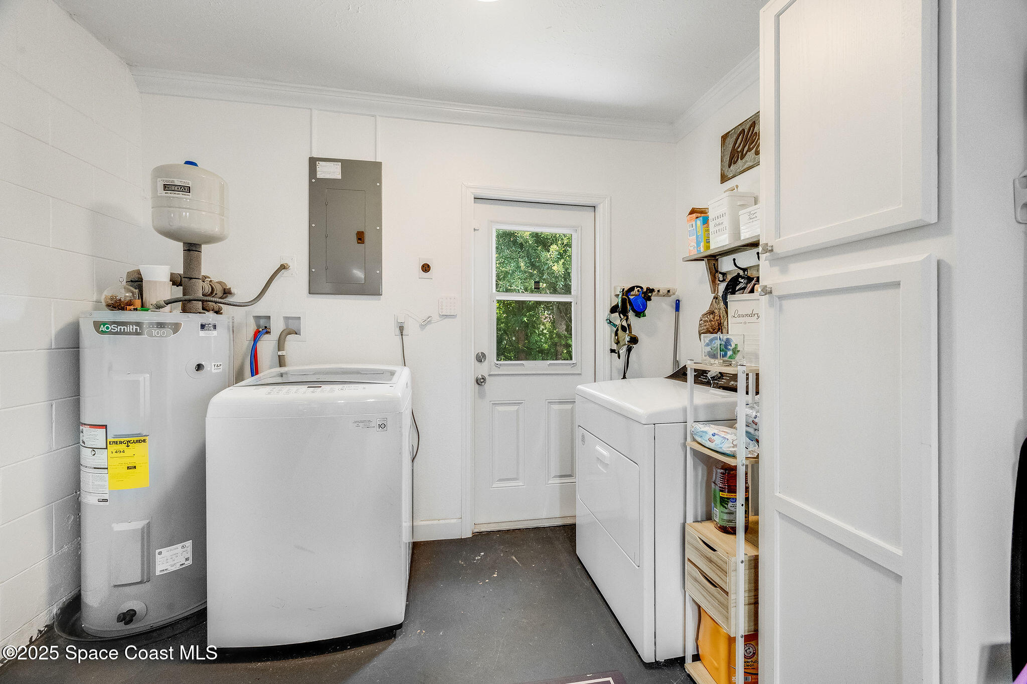 369 Western Avenue Cocoa, FL 32926 - Photo 23 of 38 a view of living room with washer and dryer