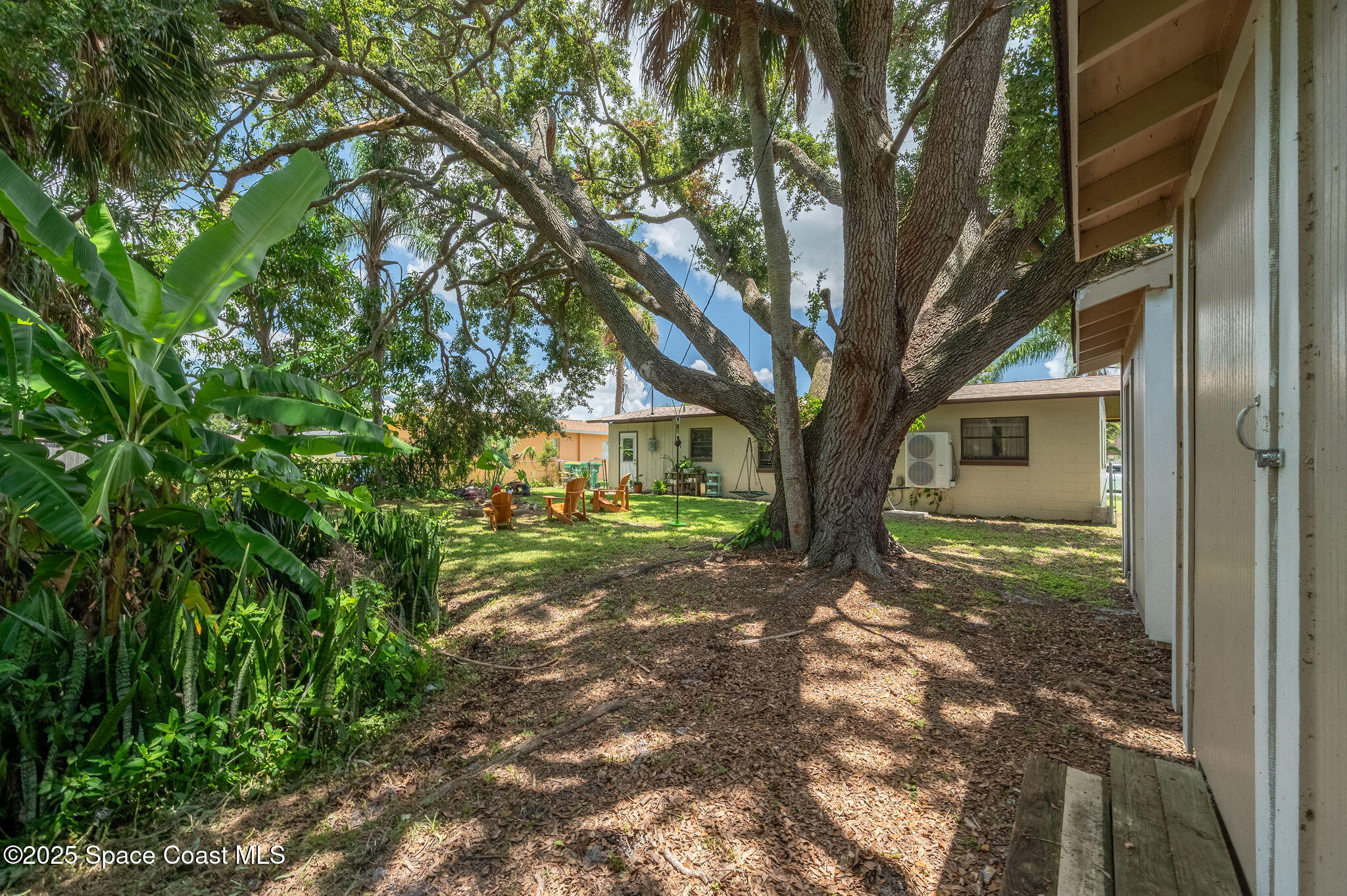369 Western Avenue Cocoa, FL 32926 - Photo 29 of 38 a view of a house with a tree