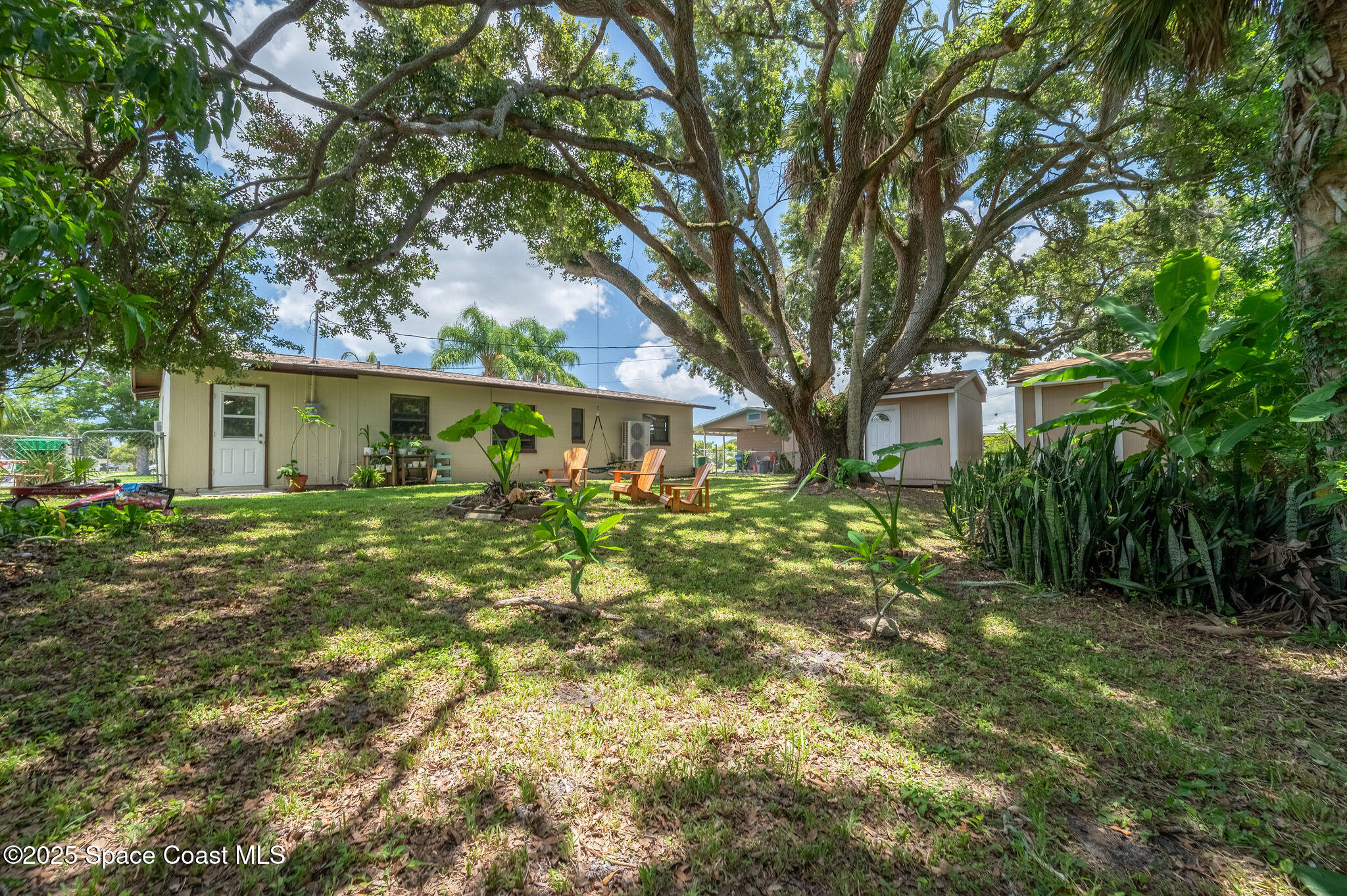 369 Western Avenue Cocoa, FL 32926 - Photo 30 of 38 a front view of a house with a yard