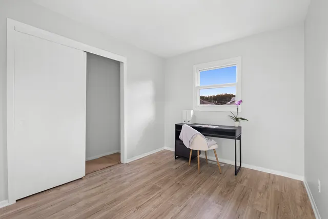 a workspace with wooden floor