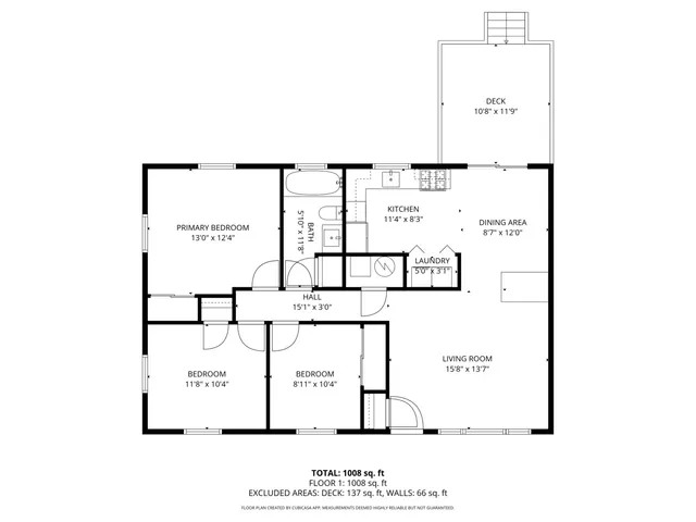 a picture of a bench in front of a wall