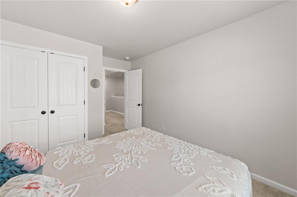 2538 Polaris Way Southwest Atlanta, GA 30331 - Photo 25 of 28 a bedroom with a bed and a shower