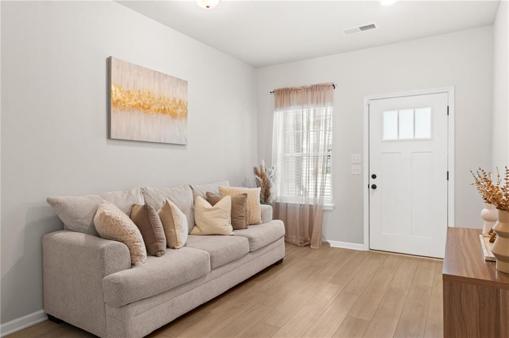 2538 Polaris Way Southwest Atlanta, GA 30331 - Photo 5 of 28 a living room with furniture and a window