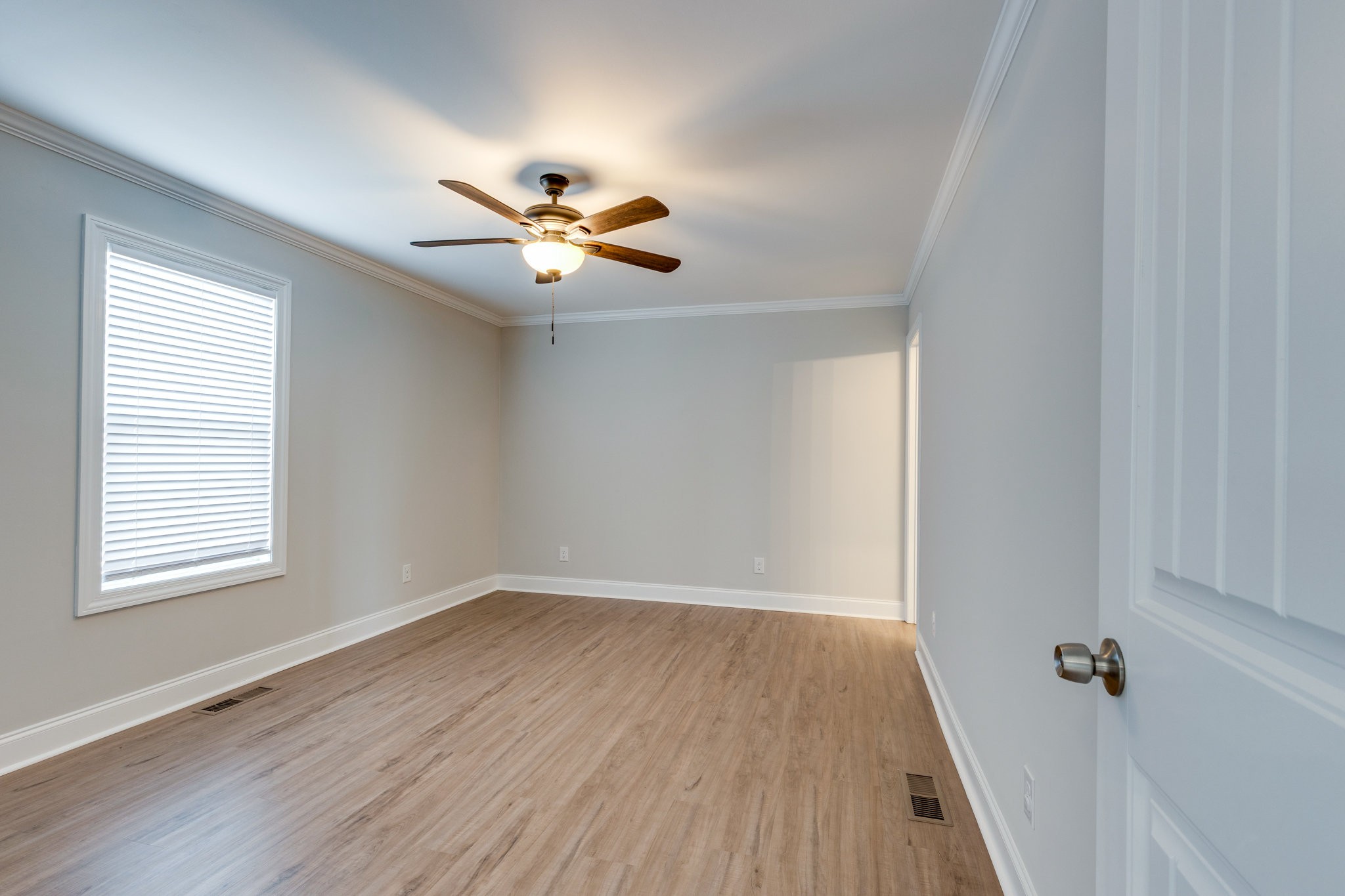 122 Fiddlers Court Pulaski, TN 38478 - Photo 13 of 27 wooden floor in an empty room with a window