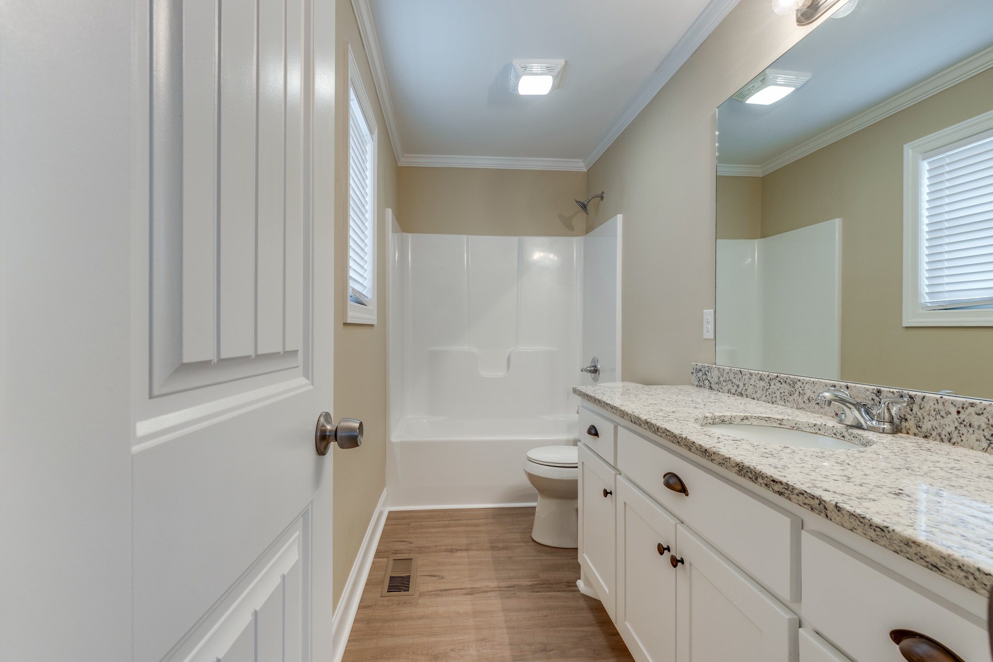 122 Fiddlers Court Pulaski, TN 38478 - Photo 16 of 27 a bathroom with a granite countertop sink toilet and shower