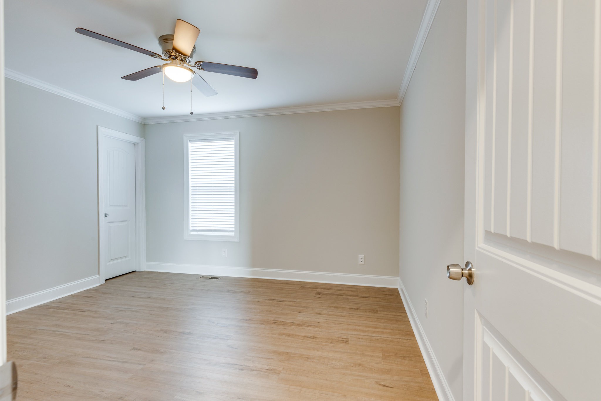 122 Fiddlers Court Pulaski, TN 38478 - Photo 17 of 27 wooden floor in an empty room with a window