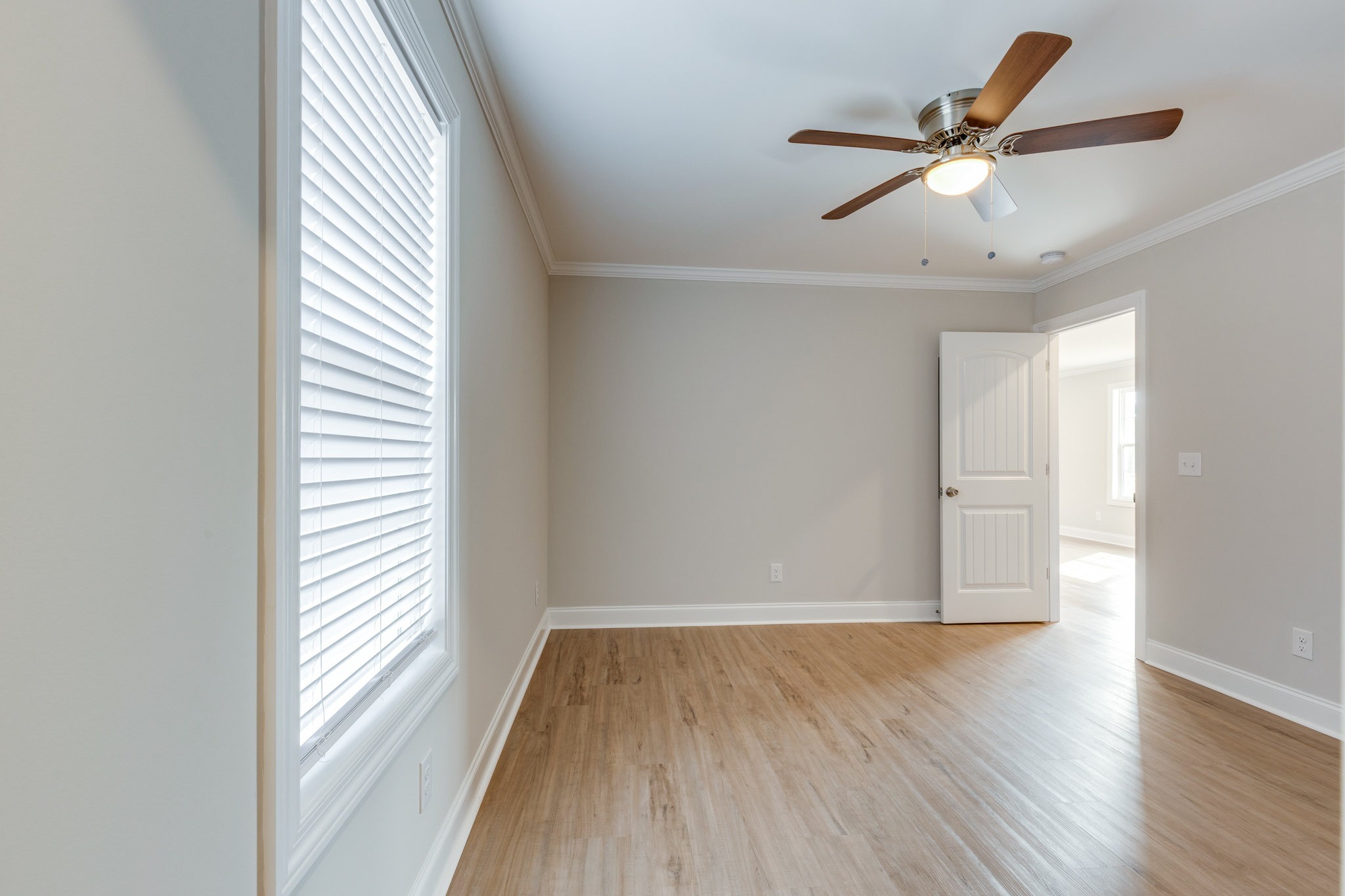 122 Fiddlers Court Pulaski, TN 38478 - Photo 18 of 27 wooden floor in an empty room with a window