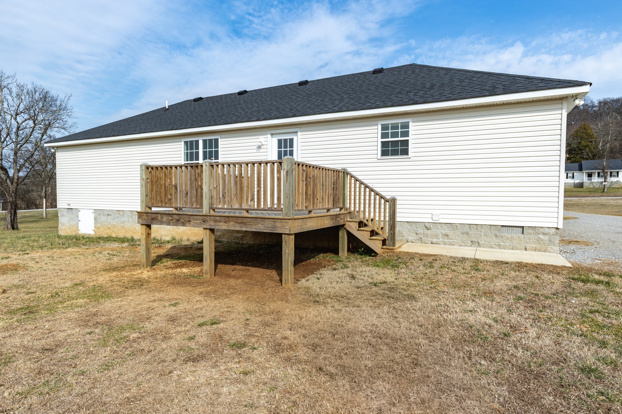122 Fiddlers Court Pulaski, TN 38478 - Photo 27 of 27 a backyard of a house with table and chairs