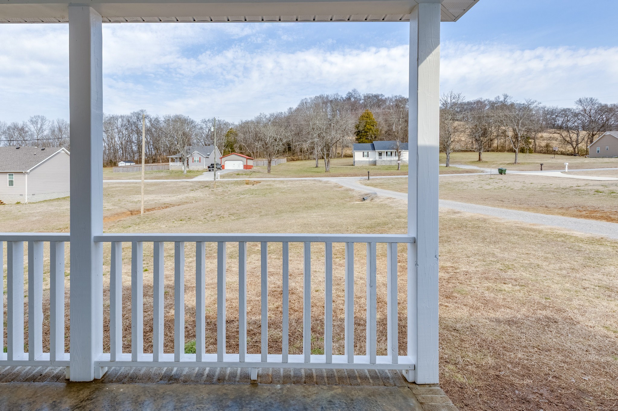 122 Fiddlers Court Pulaski, TN 38478 - Photo 4 of 27 a view of a room with wooden floor and fence