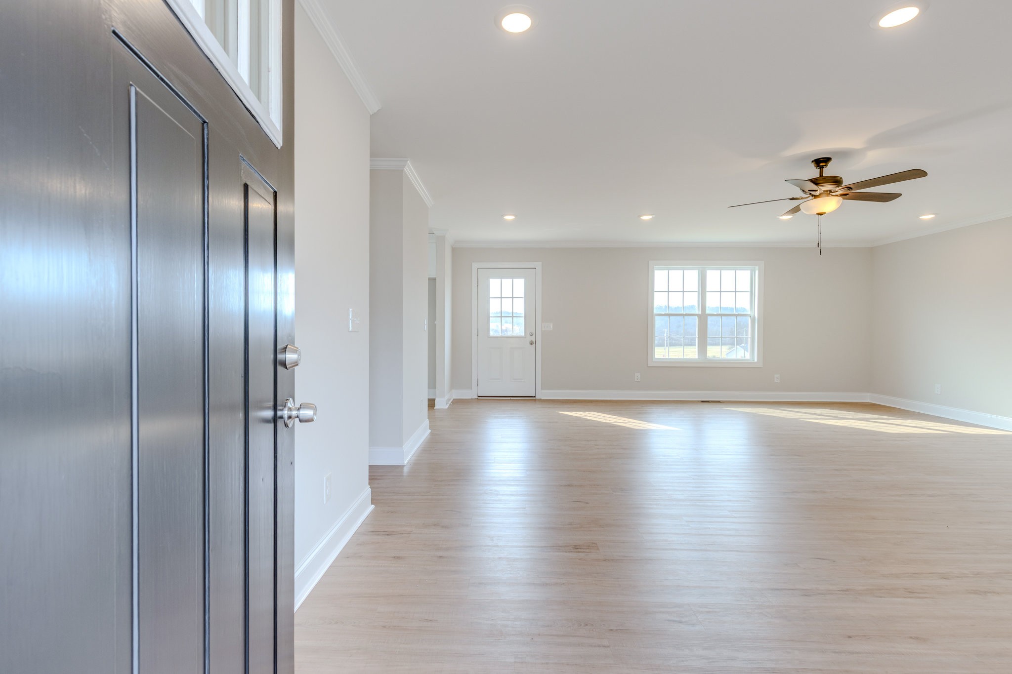 122 Fiddlers Court Pulaski, TN 38478 - Photo 5 of 27 a view of empty room with wooden floor and fan