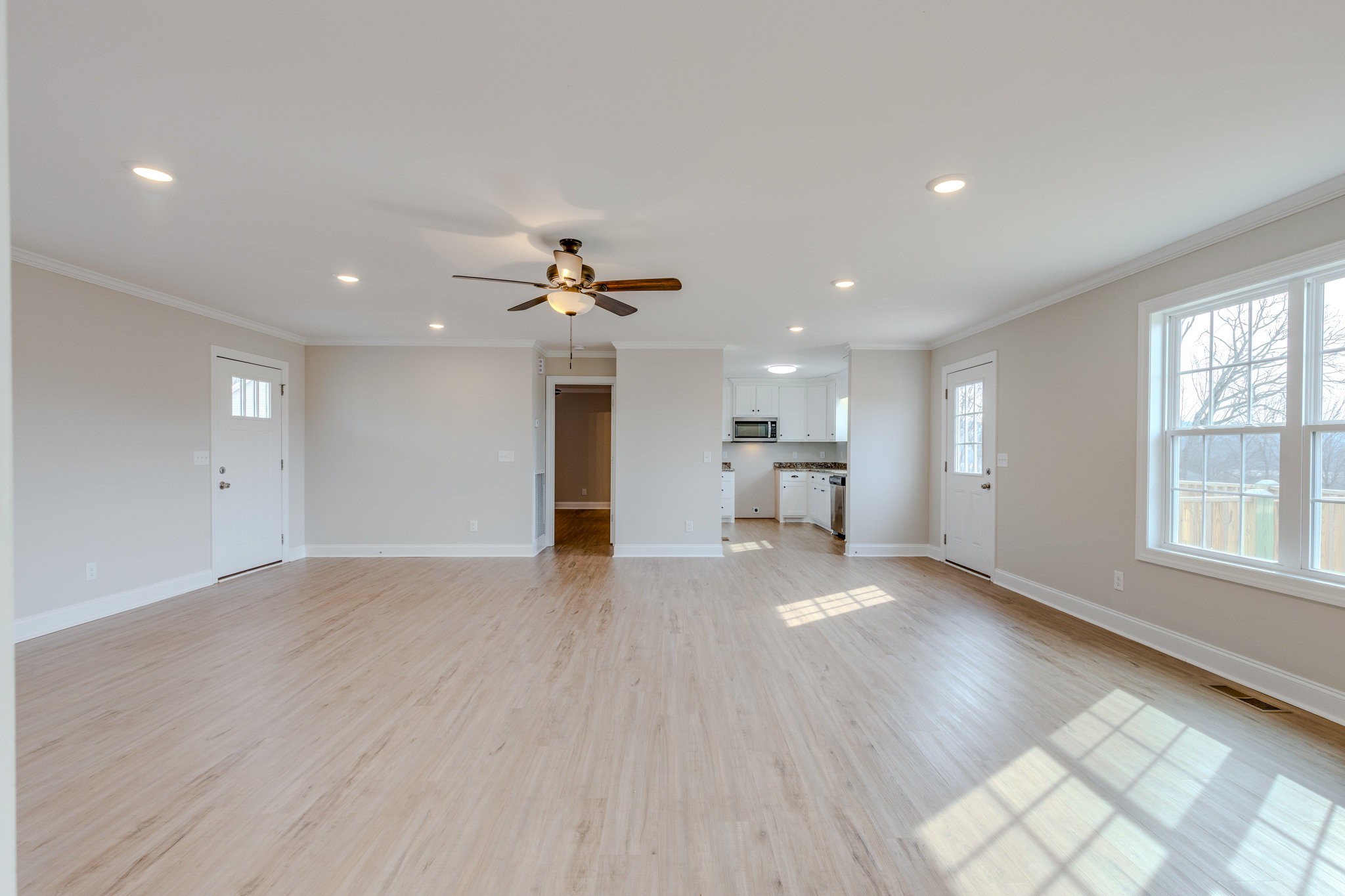 122 Fiddlers Court Pulaski, TN 38478 - Photo 6 of 27 a view of empty room with wooden floor and window