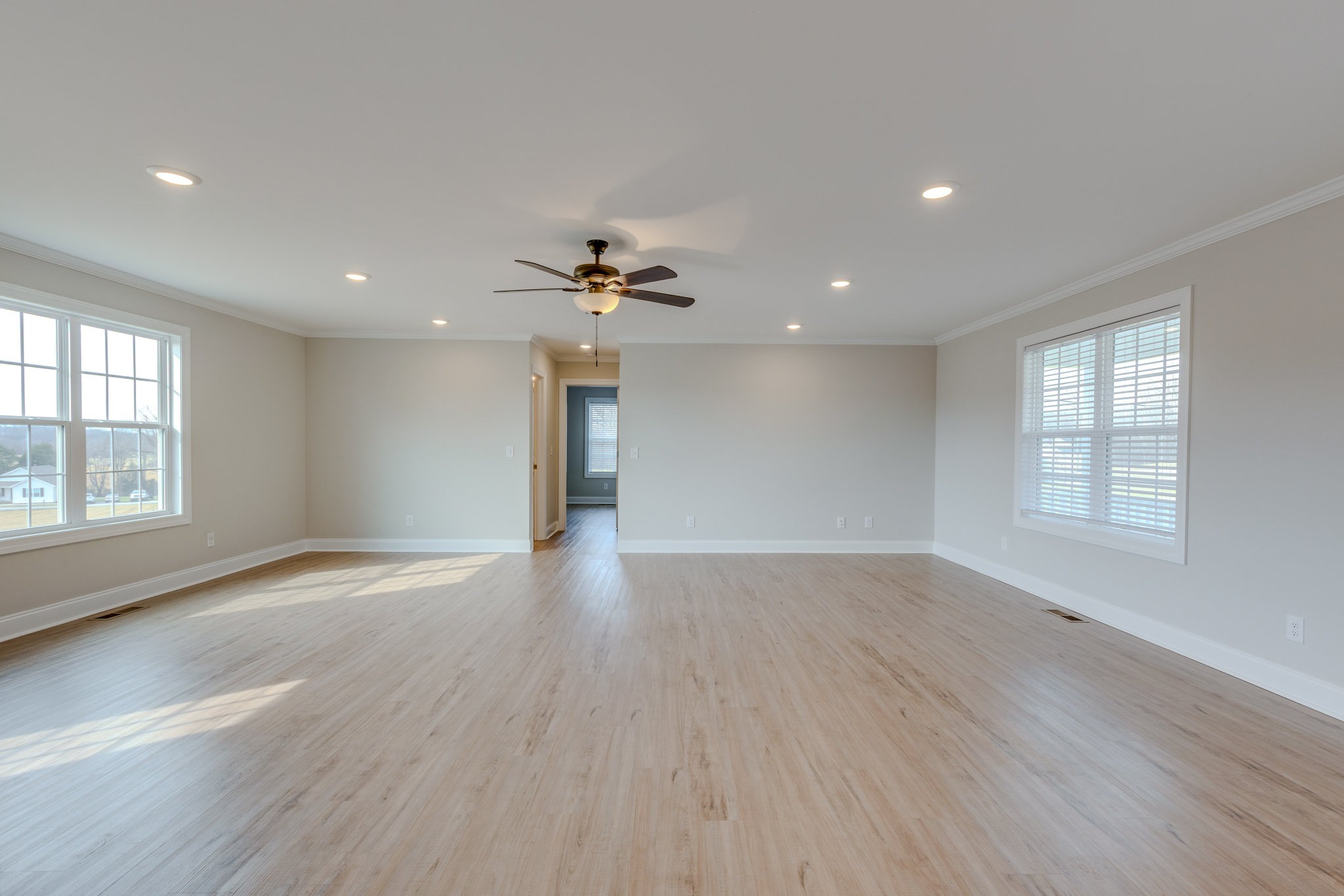 122 Fiddlers Court Pulaski, TN 38478 - Photo 7 of 27 wooden floor in an empty room with a window