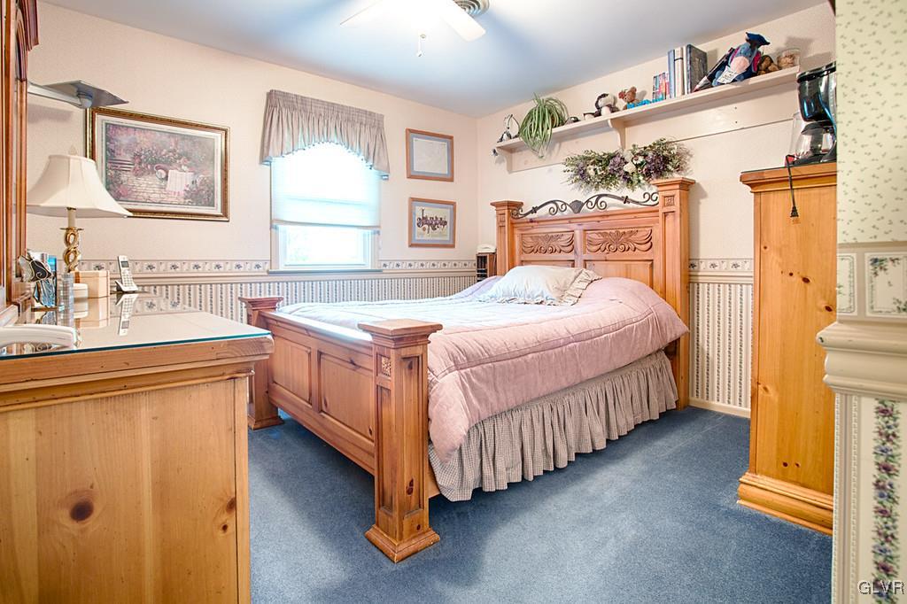 989 Park Estates Road Wind Gap, PA 18091 - Photo 13 of 41 a bedroom with a bed and a cabinets
