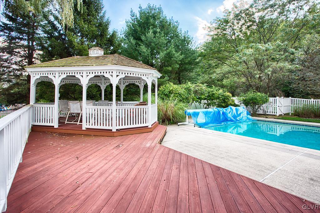 989 Park Estates Road Wind Gap, PA 18091 - Photo 23 of 41 a view of a wooden deck with a yard