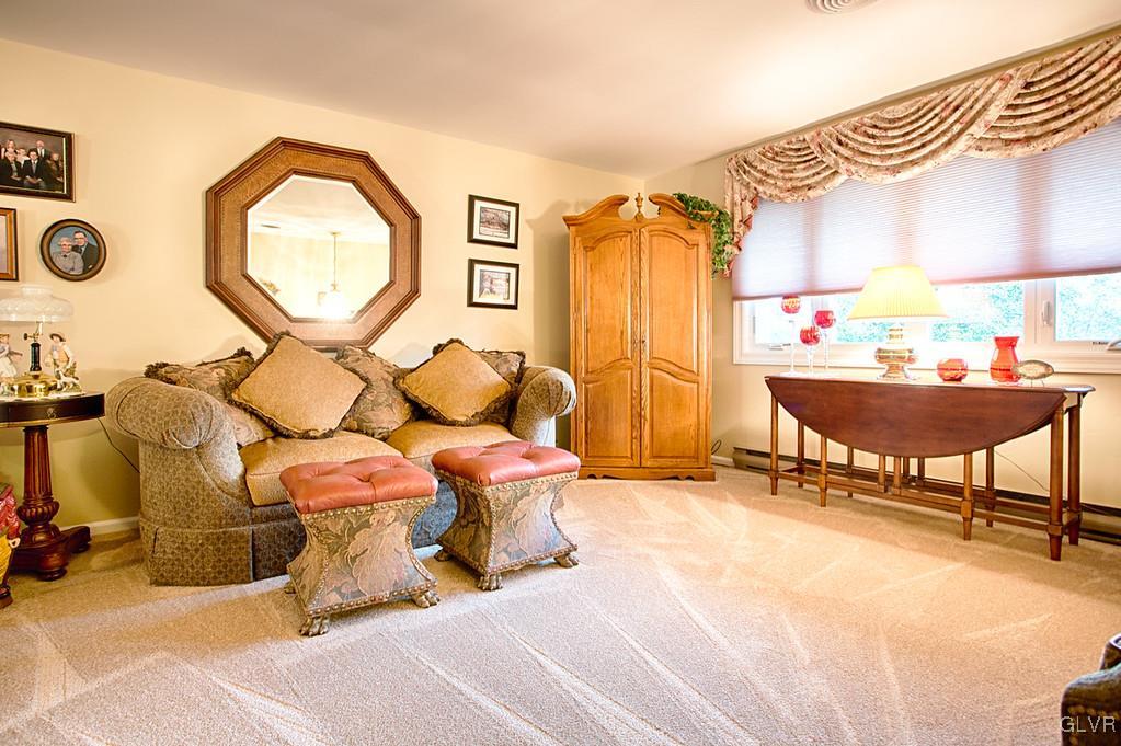 989 Park Estates Road Wind Gap, PA 18091 - Photo 3 of 41 a room with gym equipment and a large window