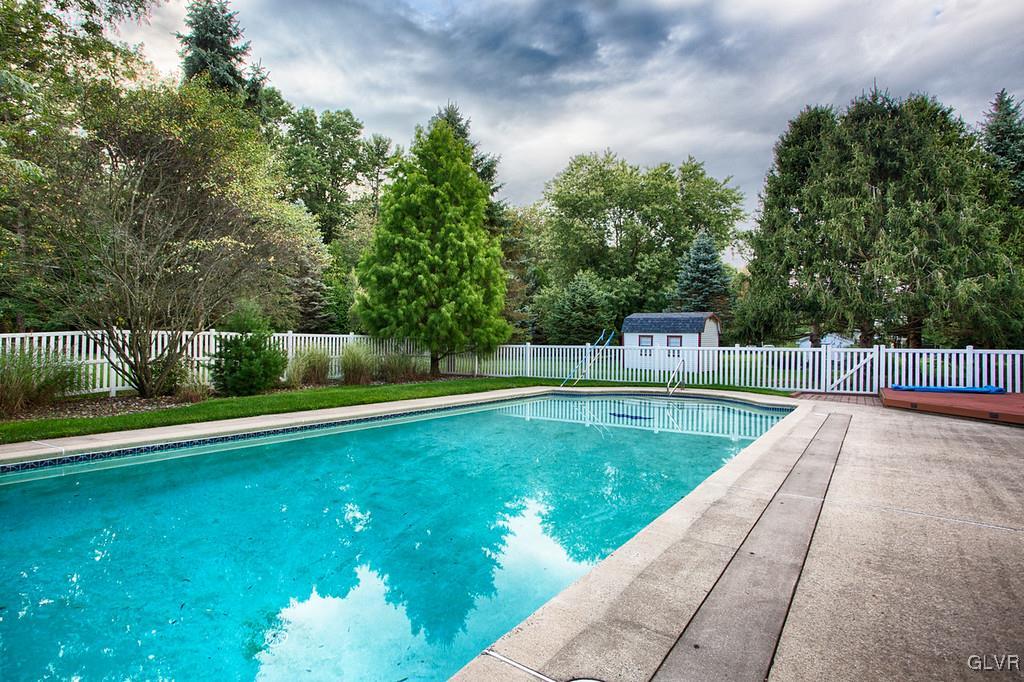 989 Park Estates Road Wind Gap, PA 18091 - Photo 32 of 41 a view of a swimming pool with a garden
