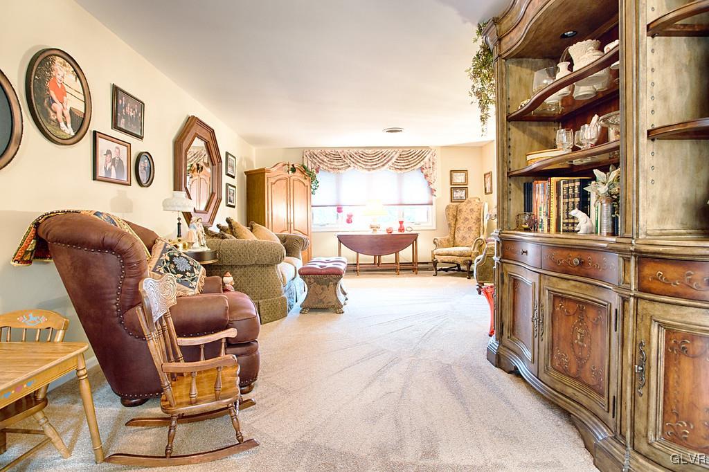 989 Park Estates Road Wind Gap, PA 18091 - Photo 4 of 41 a living room with furniture a rug and white walls