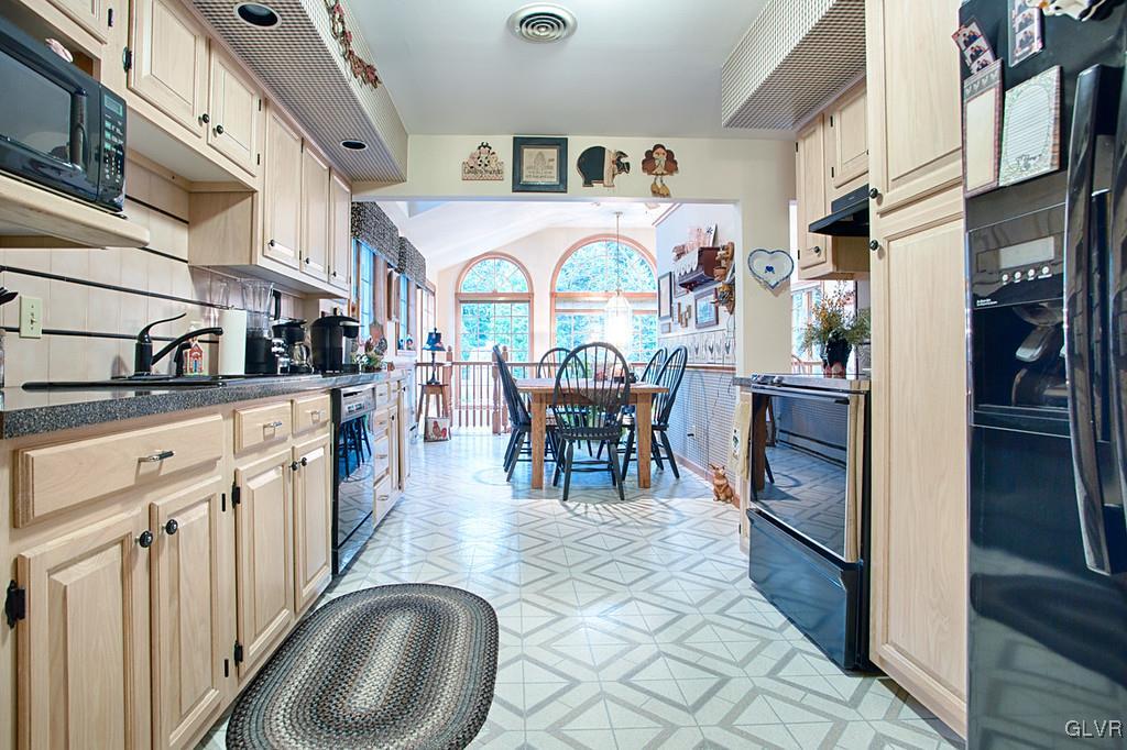 989 Park Estates Road Wind Gap, PA 18091 - Photo 9 of 41 a view of a kitchen with furniture and window