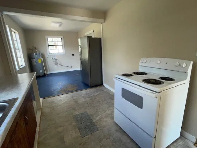 a bathroom with a sink vanity and mirror