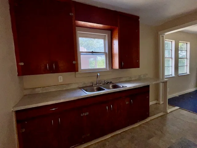 a view of a house with backyard