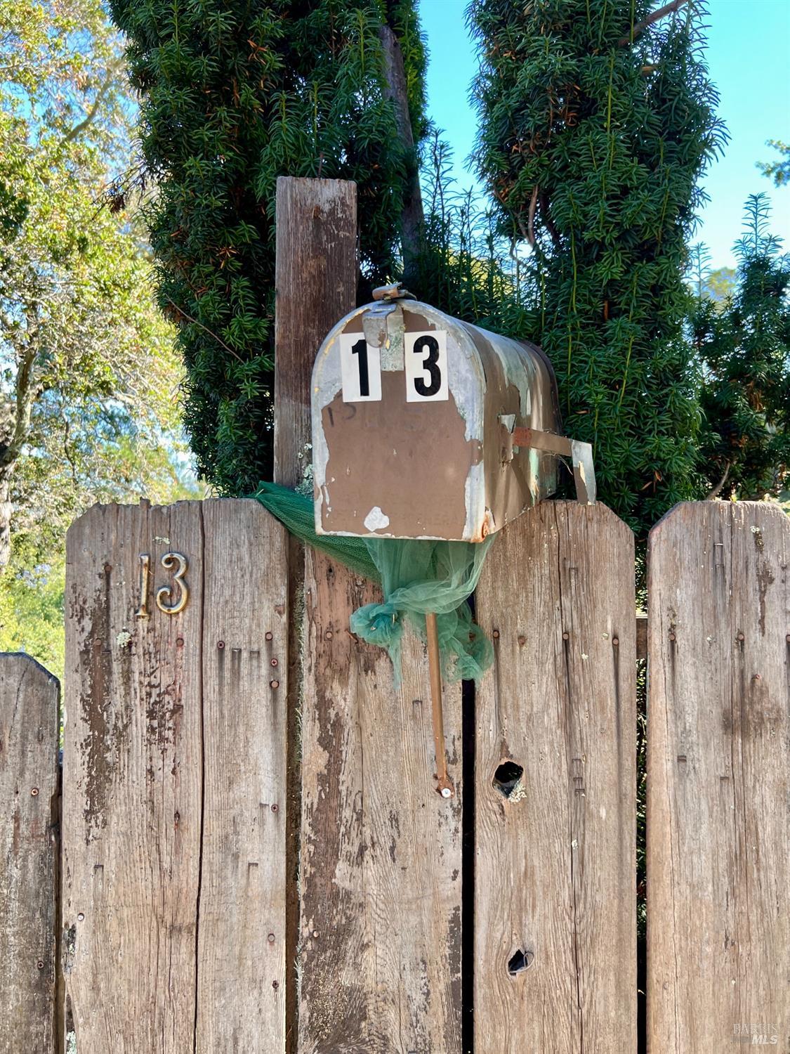 13 Ridge Road Fairfax, CA 94930 - Photo 1 of 1 a view of a wooden fence next to a road