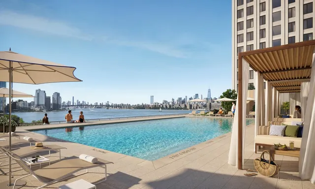 a view of a swimming pool and a patio