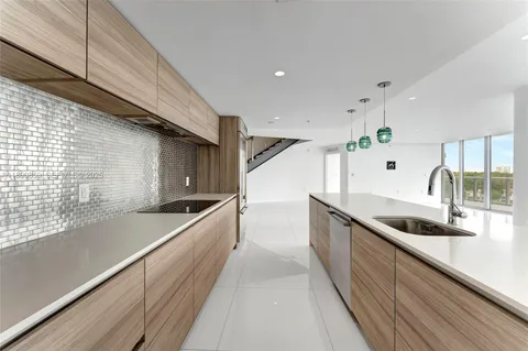 a view of swimming pool from a balcony