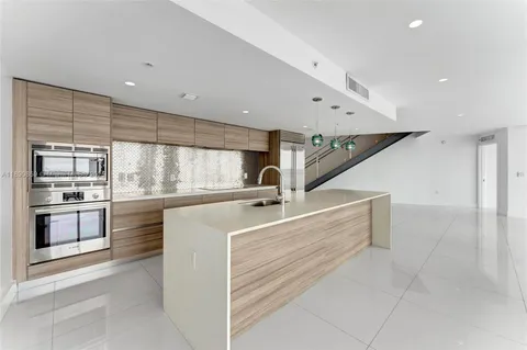 a view of a lake with a city view