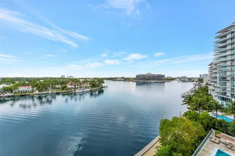 a bathroom with a sink double vanity and a mirror