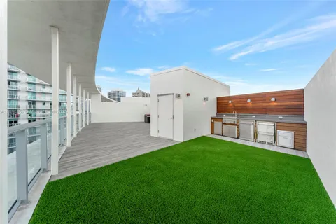 a view of a backyard with a garden and plants