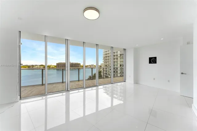 a bathroom with a sink toilet a mirror and shower
