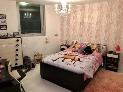 a view of a terrace with a garden and lake view