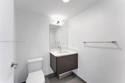 a view of living room with furniture and flat screen tv