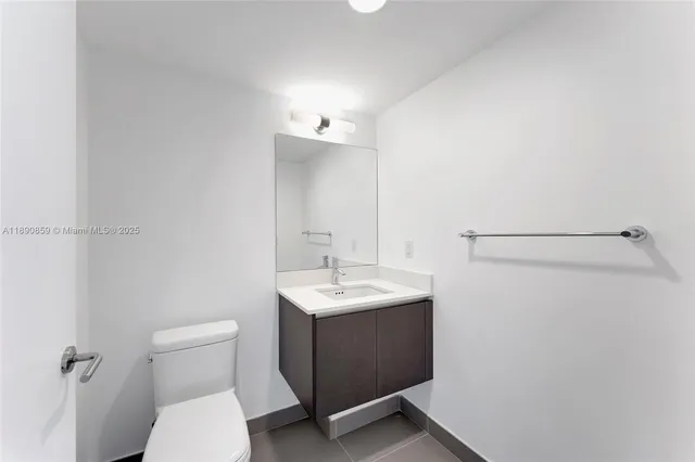 a view of living room with furniture and flat screen tv