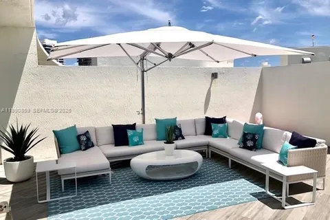 a view of a livingroom with a staircase