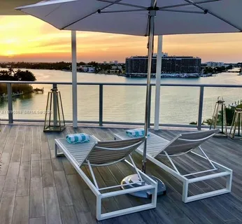 a view of a terrace with a lake view