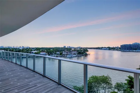 a view of a lake with a outdoor space