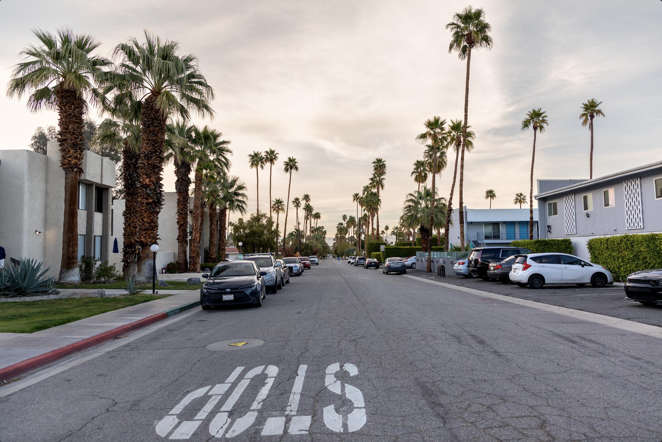 1400 East Palm Canyon Drive, Unit 109 Palm Springs, CA 92264 - Photo 12 of 14 a view of a city street with cars