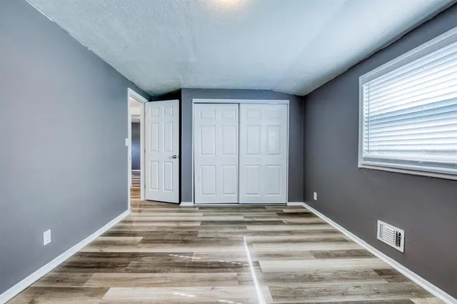 a view of a livingroom with an empty space and window