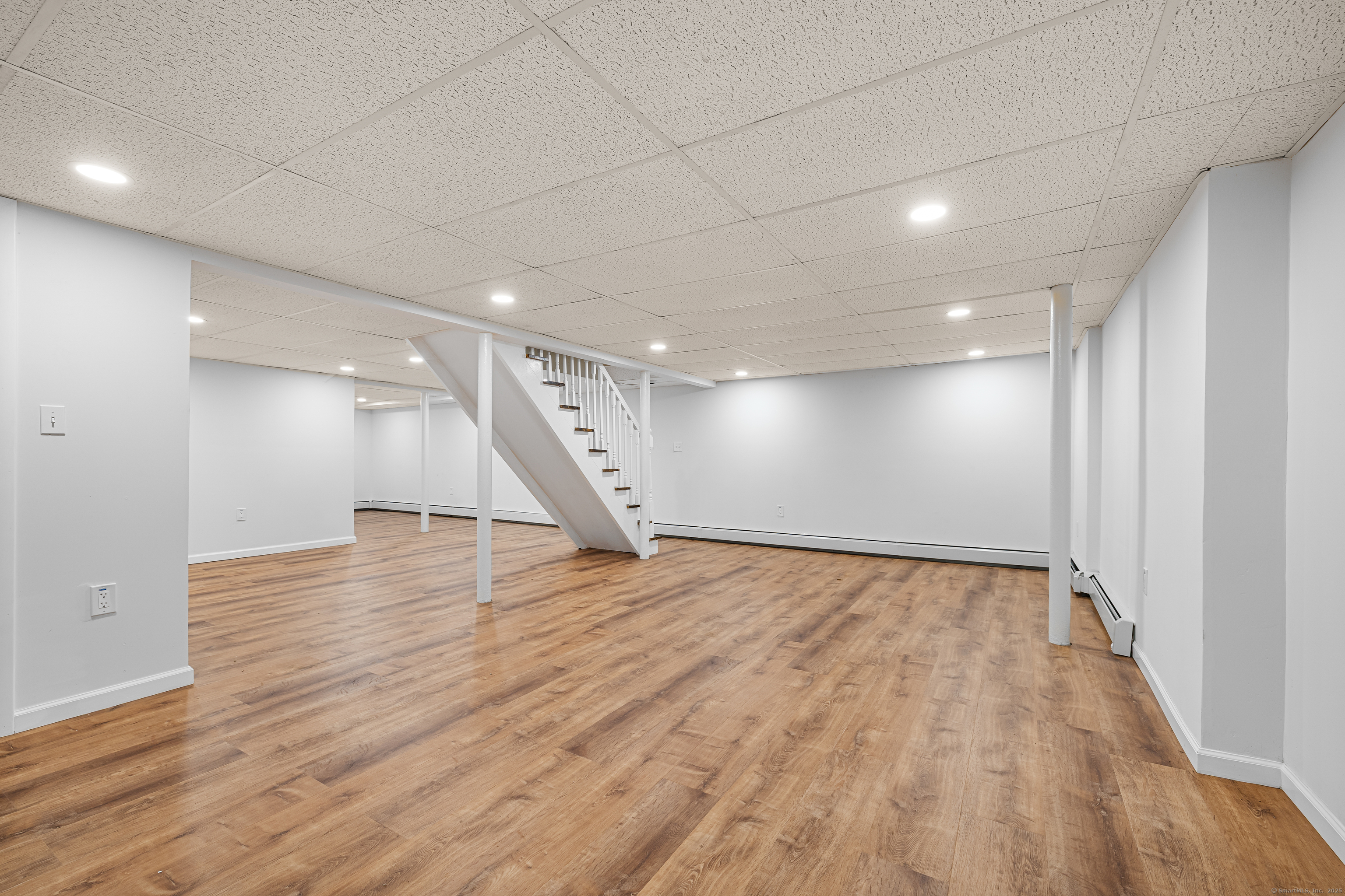 545 Simsbury Road Bloomfield, CT 06002 - Photo 20 of 39 a view of an empty room with wooden floor