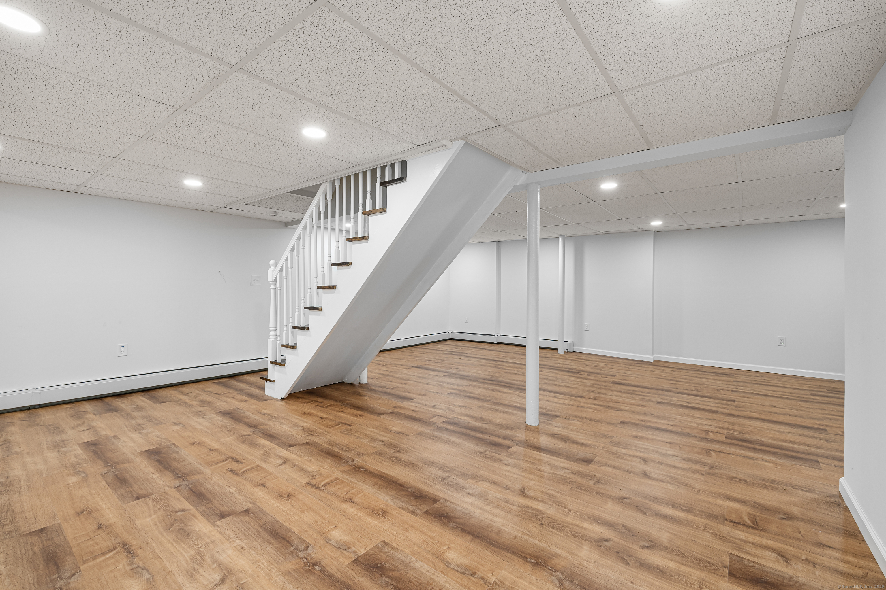 545 Simsbury Road Bloomfield, CT 06002 - Photo 21 of 39 a view of an empty room with wooden floor