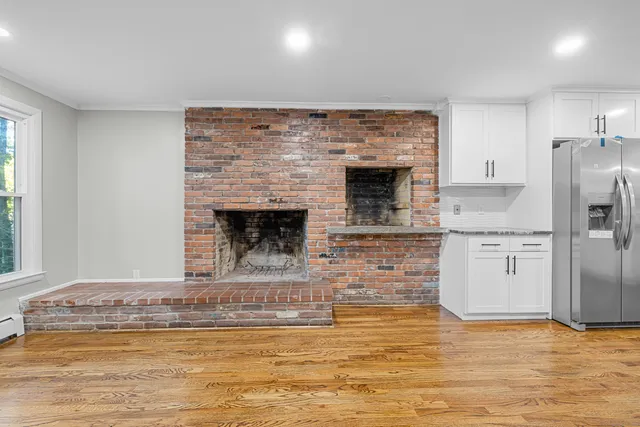 a view of a livingroom with a fireplace