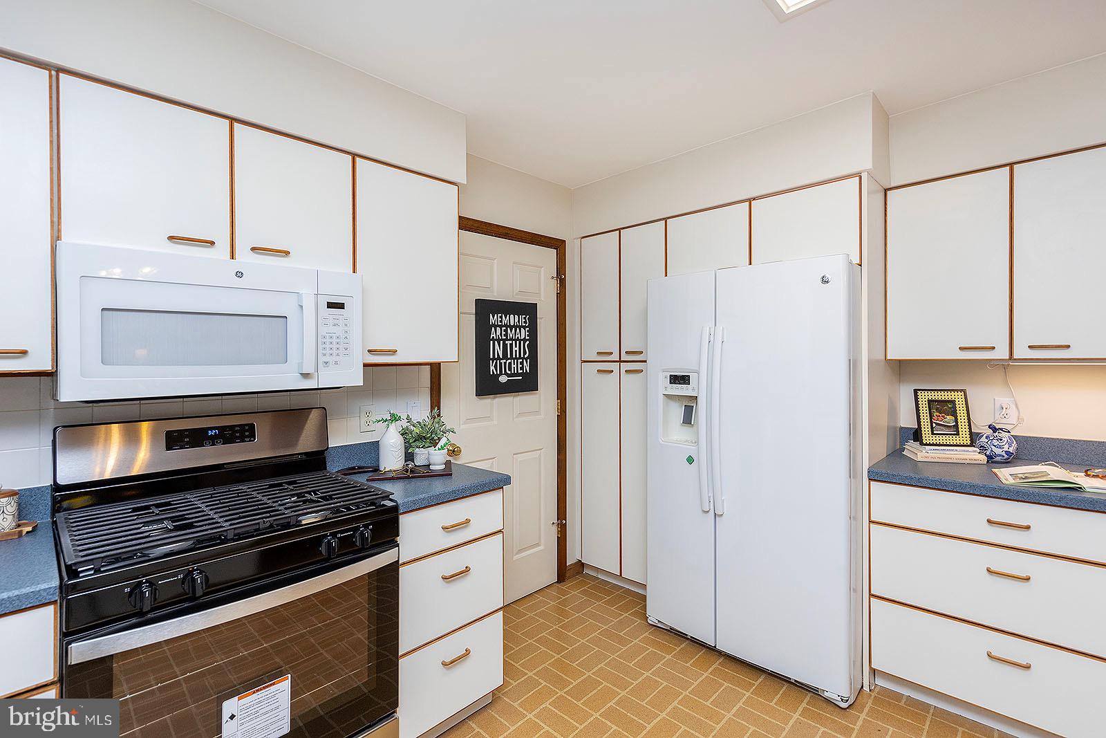 116 Forest Ridge Road Winchester, VA 22602 - Photo 44 of 73 Kitchen w/ entry to laundry rm & 1/2 bath, garage